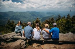 family on a mountain overlook